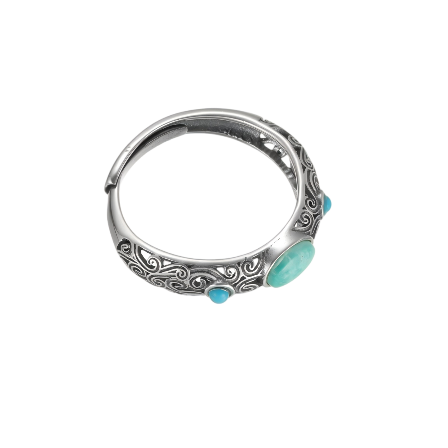 Angled view of the Eternal Scroll ring on white background, focusing on the three turquoise stones and carvings.
