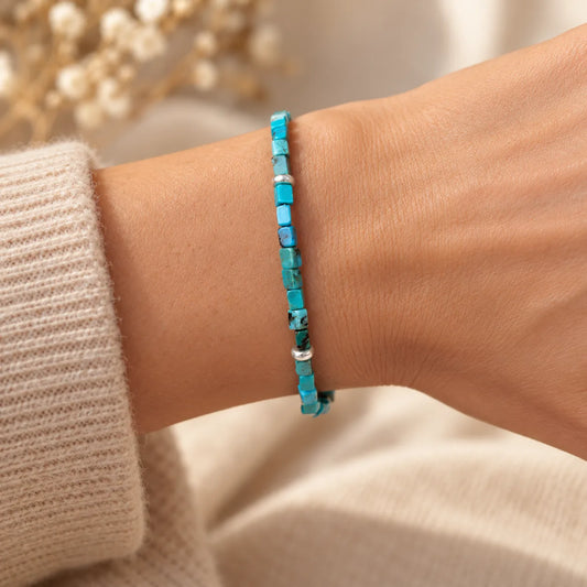 Clarity natural turquoise cube bracelet — worn close-up