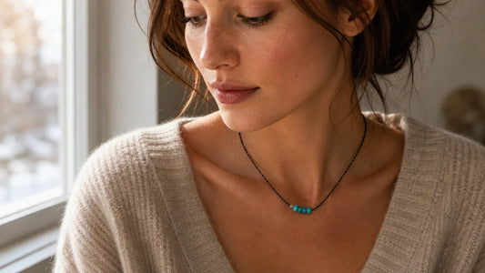 A turquoise December birthstone necklace worn close to the heart as a meaningful birthday keepsake.