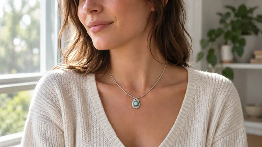 Turquoise jewelry styled with black, cream, denim and neutral clothing