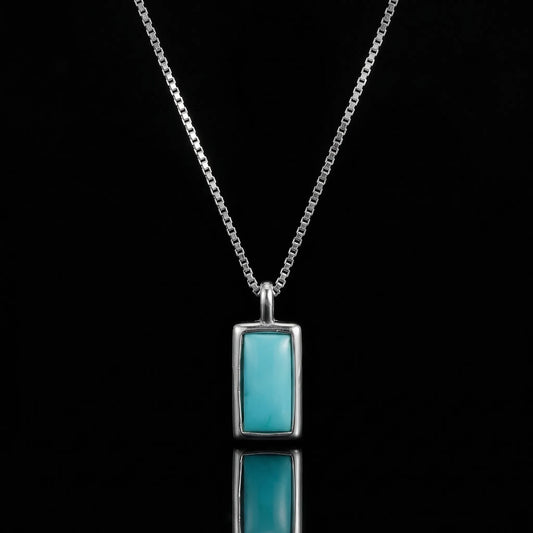 The Clarity Frame Necklace featuring a rectangular Tibetan turquoise in a 925 sterling silver frame.