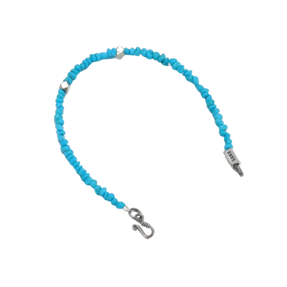 Full view of the Clear Sky bracelet on white background, showcasing the sterling silver clasp and cubes.