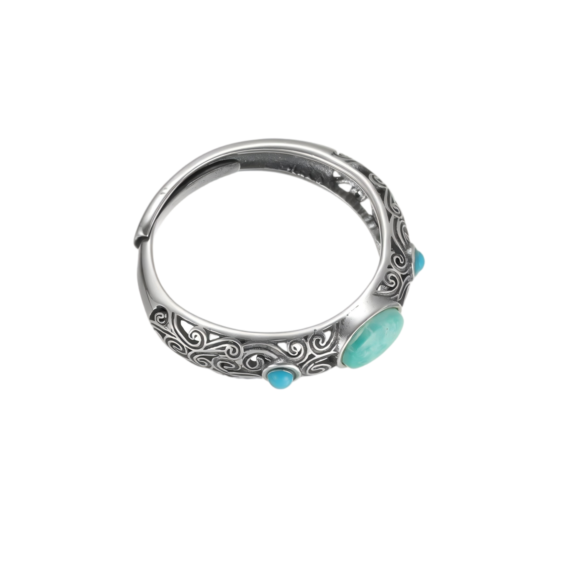 Angled view of the Eternal Scroll ring on white background, focusing on the three turquoise stones and carvings.