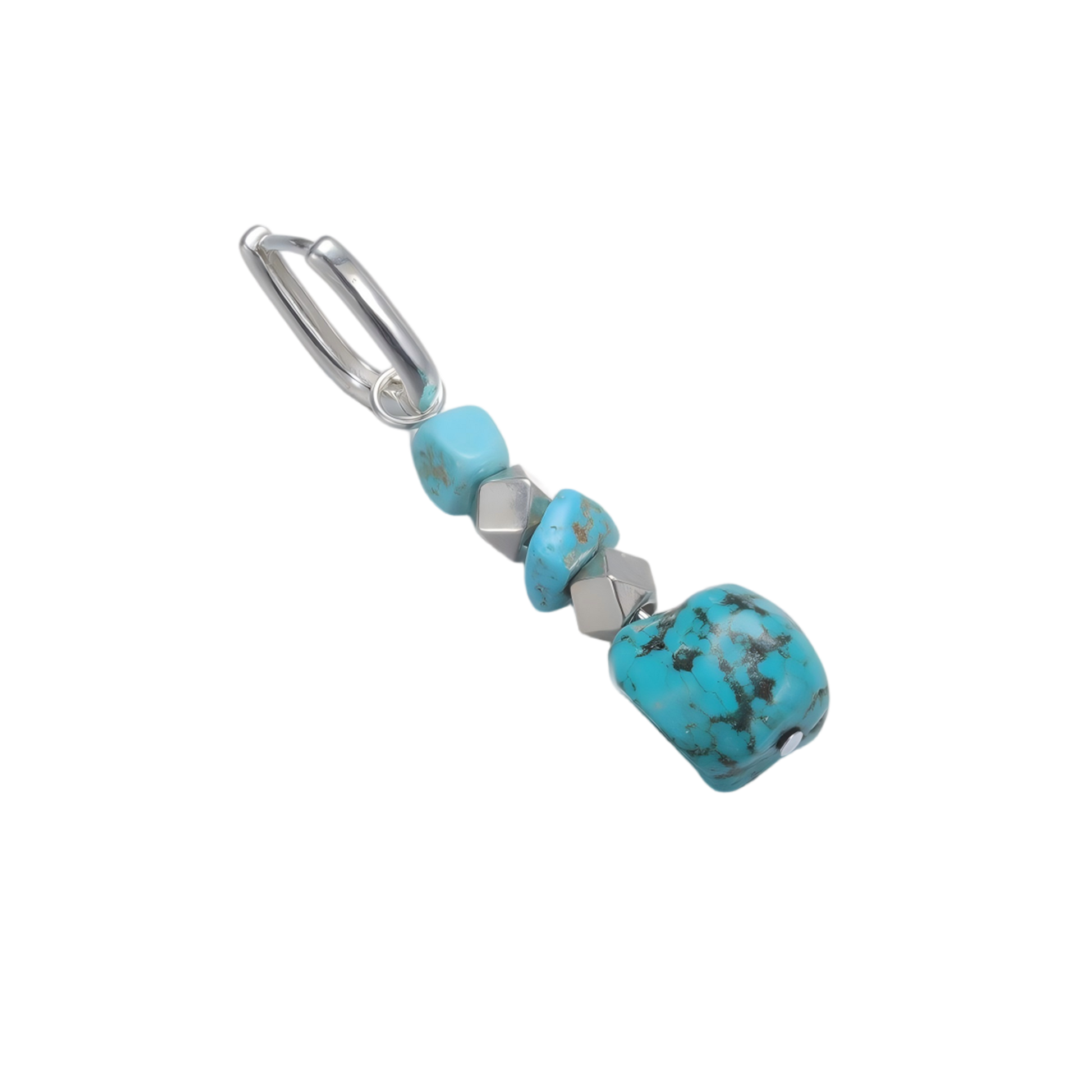 Angled view of the cascading Tibetan turquoise beads and faceted silver cube spacers on the Grounding Drops.