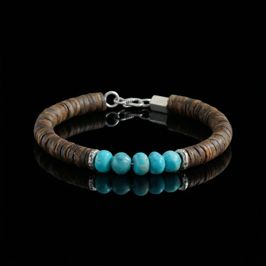 The Grounding Bracelet featuring organic brown disc beads and five centerpiece Tibetan turquoise stones.