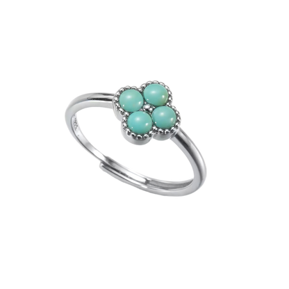 Full view of the Mandala ring on white background, highlighting the adjustable silver band and stones.
