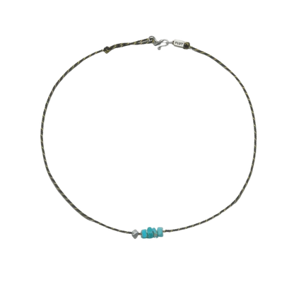 Full circle view of the Silent Pulse Tibetan turquoise choker on a white background, showing its fluid design.