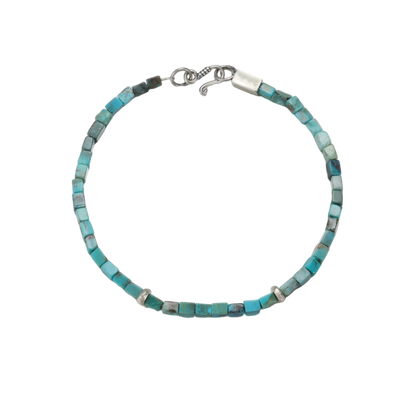 Full view of the Clarity Tibetan turquoise cube bracelet on a white background, highlighting the silver clasp.