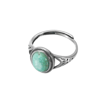Side view of the Nomad's Shield ring on white background, showcasing the geometric band cut-outs.