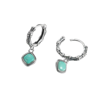 View of the open hoop clasp mechanism on the armored Tibetan turquoise and 925 silver earrings.