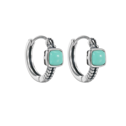 Front view of the Axiom Hoops pair on a clean white background, showcasing the square blue stones.
