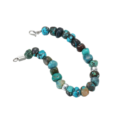 Full view of the Pilgrim's Path bracelet on a white background, showcasing the heavy-duty silver clasp.