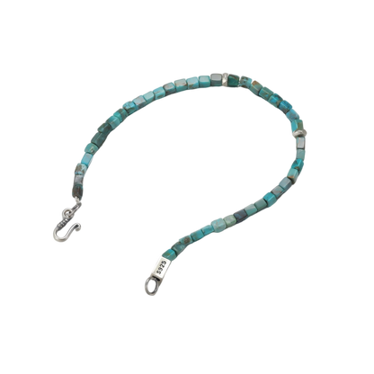 Detailed view of the precision-cut turquoise cubes and hand-finished sterling silver spacers.