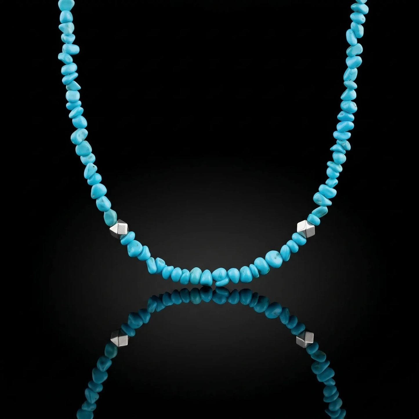 The Quiet Current Choker featuring natural Tibetan turquoise chips and faceted 925 sterling silver beads.