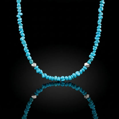 The Quiet Current Choker featuring natural Tibetan turquoise chips and faceted 925 sterling silver beads.