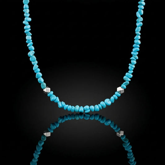 The Quiet Current Choker featuring natural Tibetan turquoise chips and faceted 925 sterling silver beads.