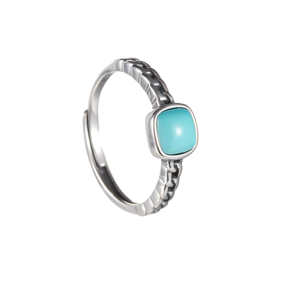 Full view of the Rational Link ring on a white background, highlighting the Cuban link texture.