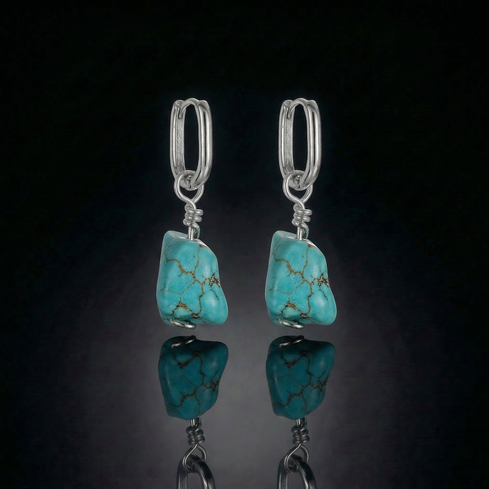 The Raw Drop featuring freeform Tibetan turquoise nuggets and polished sterling silver hoops.