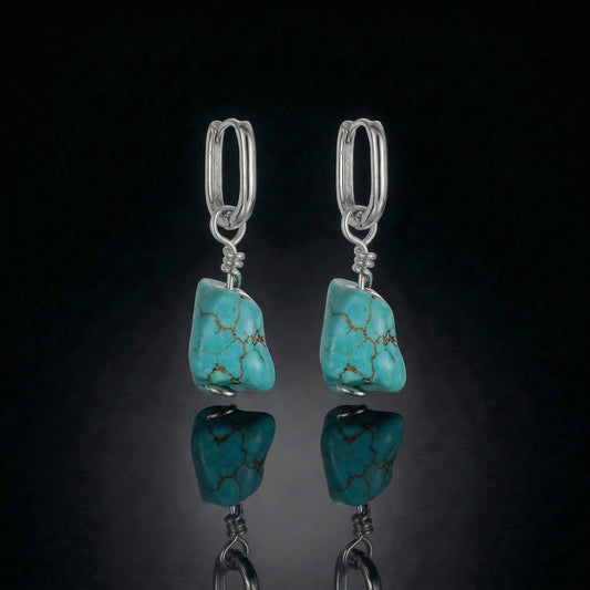 The Raw Drop featuring freeform Tibetan turquoise nuggets and polished sterling silver hoops.