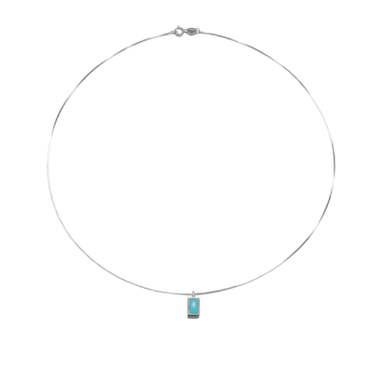 Full circle view of the Clarity Frame Tibetan turquoise necklace on a white background.