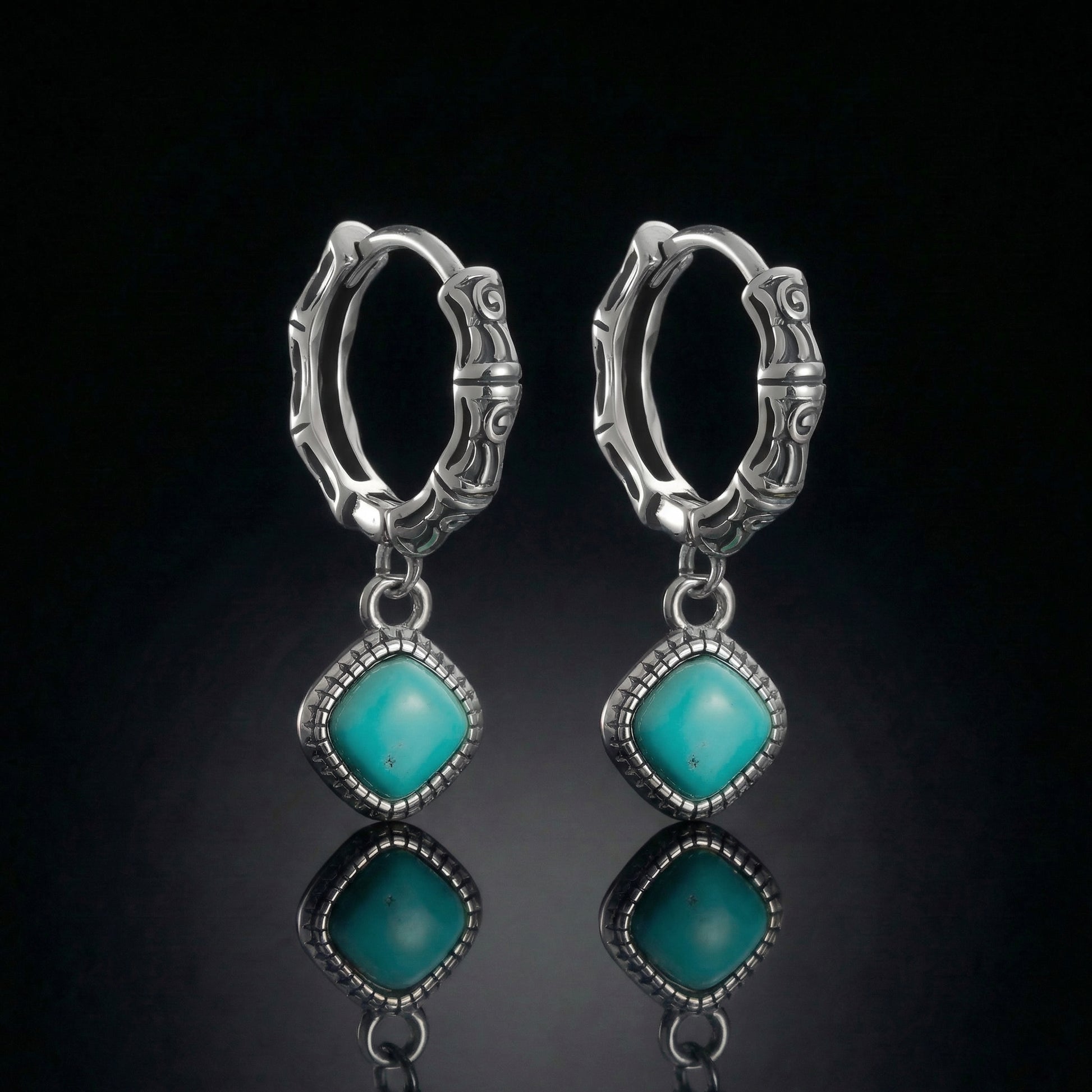 The Sentinel Drops featuring square-cut Tibetan turquoise and bamboo-textured sterling silver hoops.