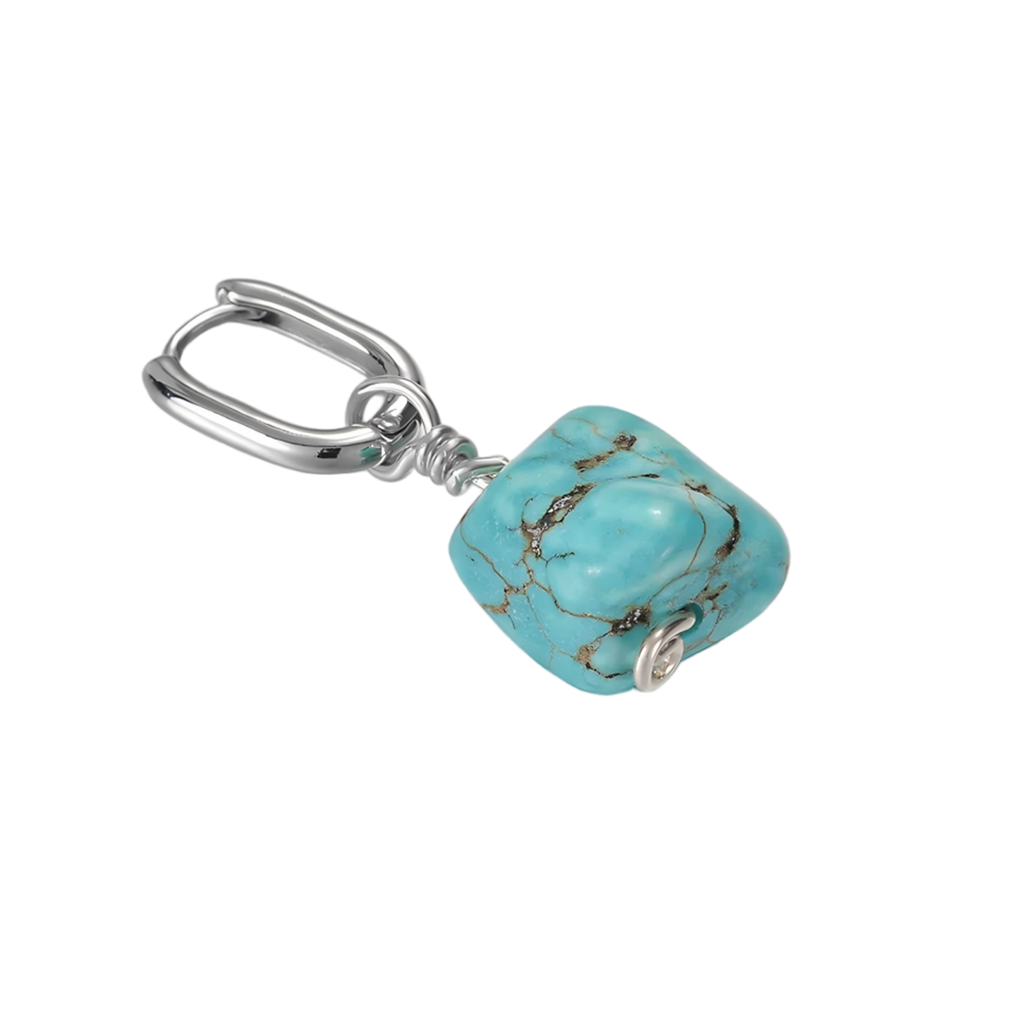 Detailed view of the organic brown matrix pattern on the Tibetan turquoise nugget and the 925 silver hoop clasp.
