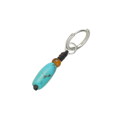 Detailed view of the 925 sterling silver hoop, the hand-woven knot, and the organic matrix of the turquoise cylinder.