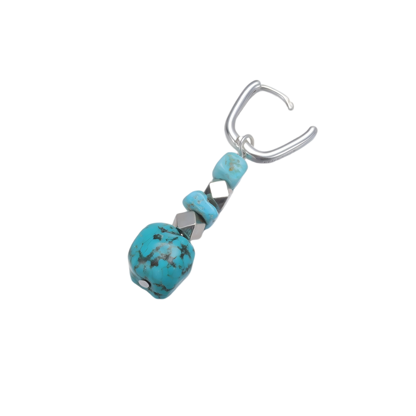 Detailed view of the U-shaped 925 sterling silver hoop, geometric spacers, and freeform Tibetan turquoise stone.