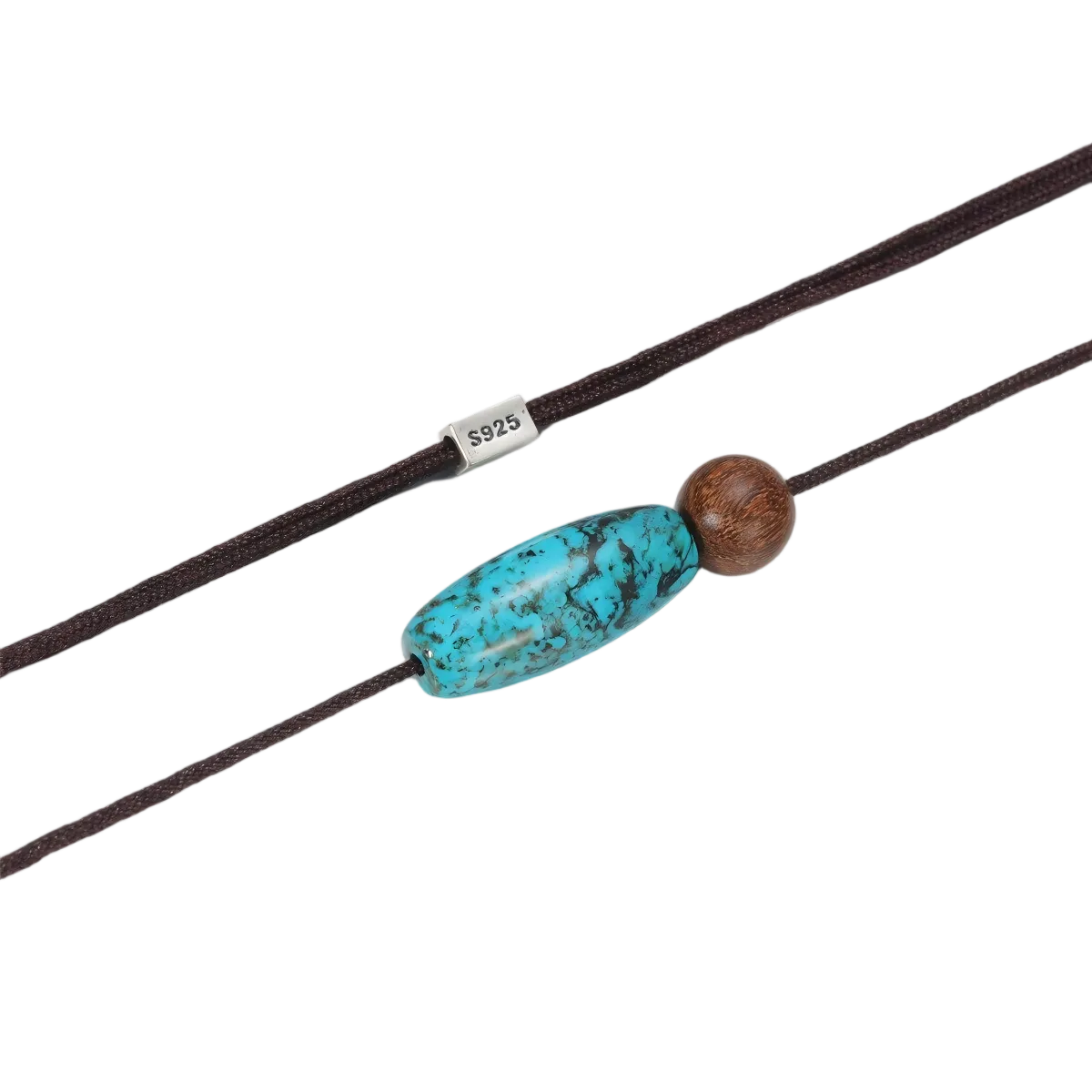 Close-up of the natural matrix in the barrel-cut turquoise and the discrete 925 sterling silver clasp.