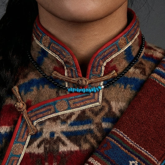 Close-up of a model wearing the Quiet Dawn necklace for emotional grounding and anxiety relief.