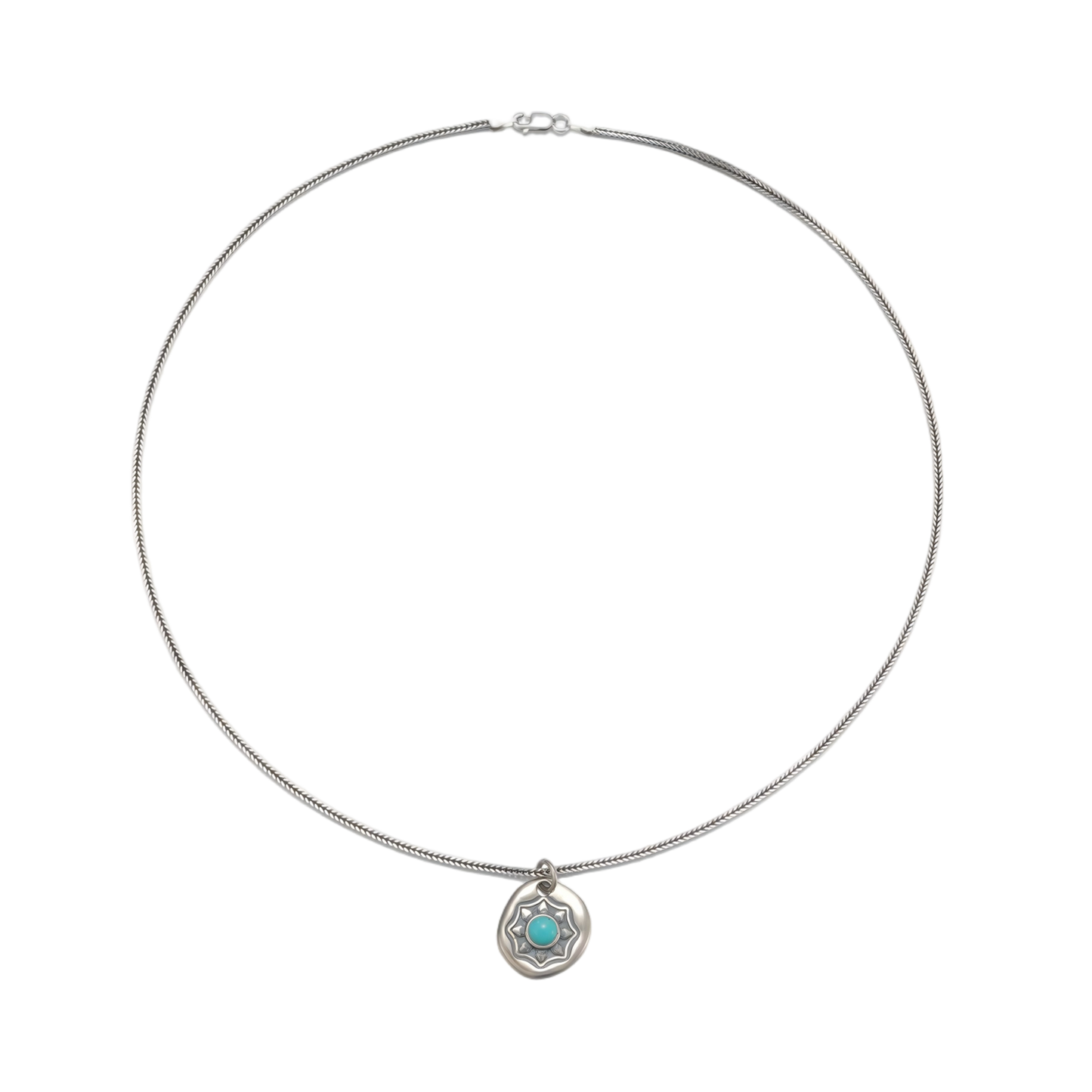 Full view of the substantial woven sterling silver chain and the Shield talisman charm.
