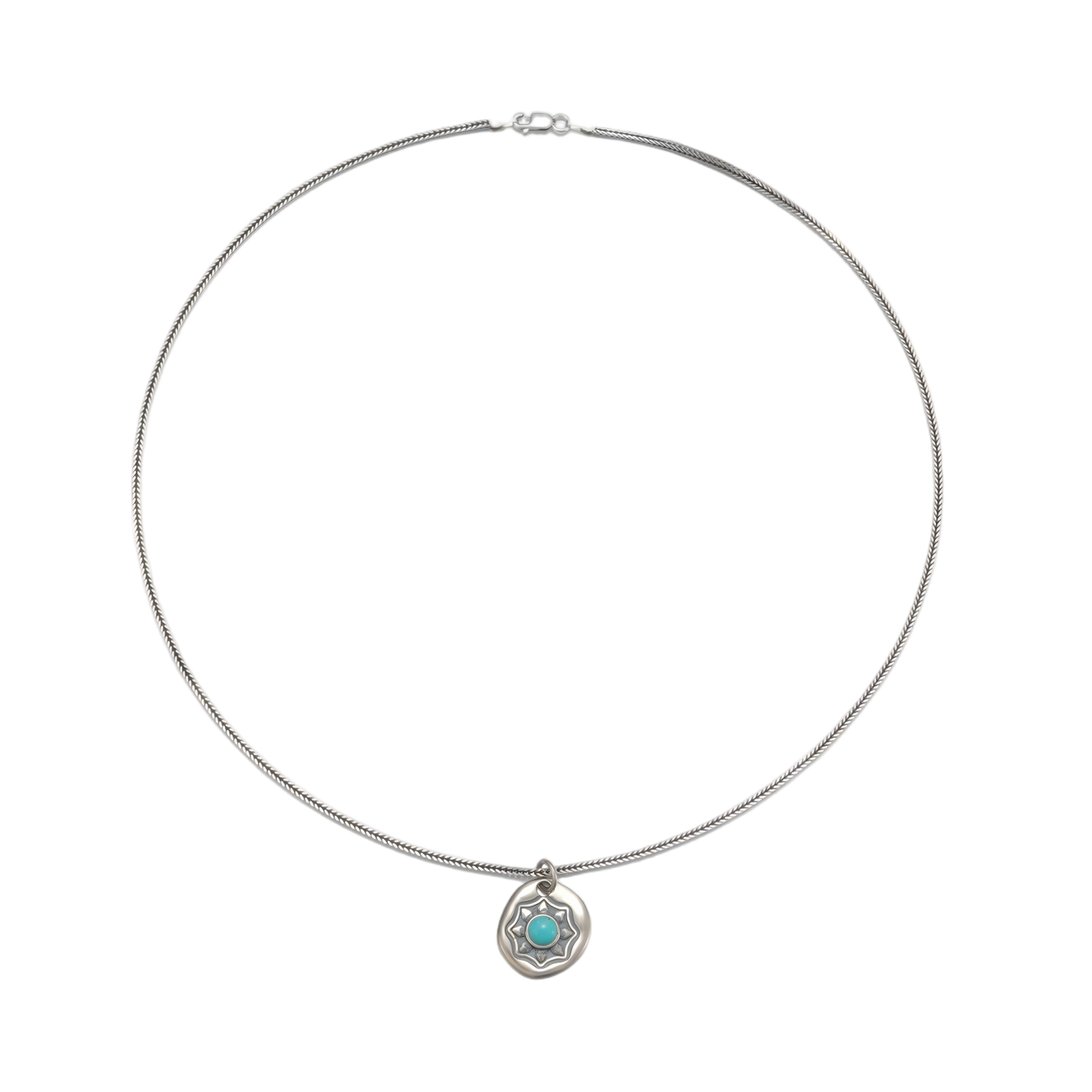 Full view of the substantial woven sterling silver chain and the Shield talisman charm.